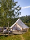 Exploring the Great Outdoors: Camping, Glamping, and a Beige Tent in the Forest for the Ultimate Nature Getaway and Wilderness