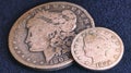 Exploring History Up Close: Macro Shot of antique weathered 1902 U.S. Silver Dollar and Nickel Coin, Coins, Money Royalty Free Stock Photo