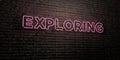 EXPLORING -Realistic Neon Sign on Brick Wall background - 3D rendered royalty free stock image