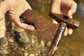 Exploring of river with magnet on rope and finding of hammer and axe