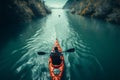 Exploring the rivers beauty while kayaking downstream on a thrilling adventure