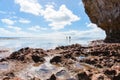 Exploring rock pools on coral shelf on tropical Niue Royalty Free Stock Photo