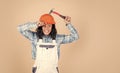 exploring tools. female worker. Architecture. woman architect in helmet. girl in checkered shirt and protective hard hat