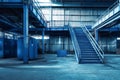 Exploring the vibrant blue interior of an industrial waste processing plant with striking staircase and worker\'s playground Royalty Free Stock Photo