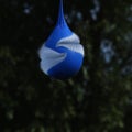 Explosing Blue Balloon with Water inside, Movement sequence Royalty Free Stock Photo