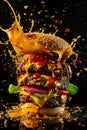 The explosion of big burger with flying ingredients. Exploding hamburger Royalty Free Stock Photo