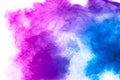 Explosion of blue pink colored powder isolated on white background.Pink blue dust splash Royalty Free Stock Photo