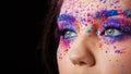 Explosion of color, bright creative makeup, colorful eyeshadow.