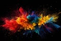 Explosion of colored powder, isolated on black background. Abstract colored background, color dust splash on a dark black Royalty Free Stock Photo