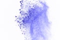 Explosion of colored powder on white background. Blue dust explode on isolate background. Paint Holi. Colorful cloud splash.