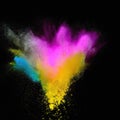 Explosion of colorful powder isolated on dark black background. Holi paint color dust explode in freeze motion. Generative AI Royalty Free Stock Photo