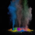 Explosion of colorful powder isolated on dark black background. Holi paint color dust explode in freeze motion. Generative AI Royalty Free Stock Photo