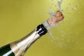 Explosion of green champagne bottle cork Royalty Free Stock Photo