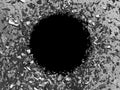 Explosion hole in concrete cracked wall. Industrial background Royalty Free Stock Photo