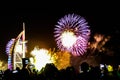 Explosion of multi-colored fireworks at Burj Al Arab Jumeirah Dubai against the night sky on a new year c Royalty Free Stock Photo