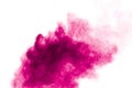 Explosion of pink colored powder isolated on white background.Pink dust splash Royalty Free Stock Photo