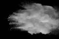 Explosion of white dust on black background