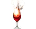 The explosion of wine in a glass, a lot of splashes and fragments, the harm of alcohol Royalty Free Stock Photo