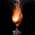 The explosion of wine in a glass, a lot of splashes and fragments, the harm of alcohol Royalty Free Stock Photo