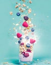 Explosion of yoghurt, berries, and granola