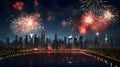 Explosions of colorful fireworks in a night scene against the backdrop of tall city skyscrapers. New Year\'s fun and festiv Royalty Free Stock Photo