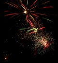 Explosions of fireworks in the sky. Multicolored sparks from the explosion of fireworks. Royalty Free Stock Photo