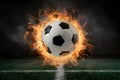 Explosive energy captured in a fiery soccer ball moment