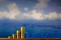 EXPORT text and stack of coin on wood table over seascape and ca Royalty Free Stock Photo