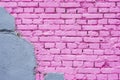 Exposed brick on damaged wall, abstract background from concrete and painted pink brick wall texture urban background