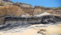 Exposed Coal Seam in the Cliff Face at Dudley Beach New South Wales Australia Royalty Free Stock Photo