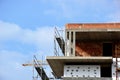 Exposed concrete and clay block structure. steel scaffolding. Royalty Free Stock Photo