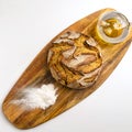 Exposition of fresh home made bread on wooden table, tasty breakfast. Bread with olive oil. Royalty Free Stock Photo