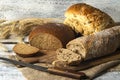 Exposition of fresh home made bread on wooden table, tasty breakfast. Bread with olive oil. Royalty Free Stock Photo