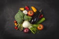 Exposition of fresh organic vegetables on wooden table. tomato, pepper, broccoli, onion, garlic, cucumber, eggplant, black Eyed P