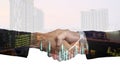 Exposure of two business handshakes for success of investment agreement and city night background, teamwork and partnership Royalty Free Stock Photo