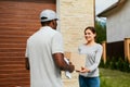 Express Delivery. Courier Delivering Package Royalty Free Stock Photo