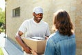 Express Delivery. Courier Delivering Package Royalty Free Stock Photo