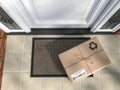 Express delivery, e-commerce online purchase concept. Parcel box on mat near front door