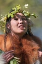 Expression young woman in clothing aborigine of Kamchatka Peninsula