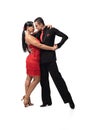Expressive couple of dancers performing tango