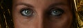 Intense green eyes of young woman