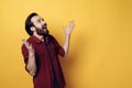 Expressive Happy Young Bearded Man Hands up Royalty Free Stock Photo