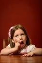 Expressive little girl playing Royalty Free Stock Photo