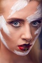 Expressive look of the girl with a bright art make up Royalty Free Stock Photo
