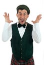 Expressive man in Scottish costume. Royalty Free Stock Photo