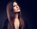 Expressive model posing in black jacket with long straight hair Royalty Free Stock Photo