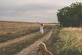 Expressive wild dance in sunset time in romantic countryside