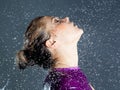 Expressive woman with falling water droplets Royalty Free Stock Photo