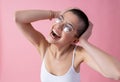 Positive girl touching her head and laughing stock photo