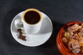 Expresso coffee with beans by German rock sugar Brauner Kandis i Royalty Free Stock Photo